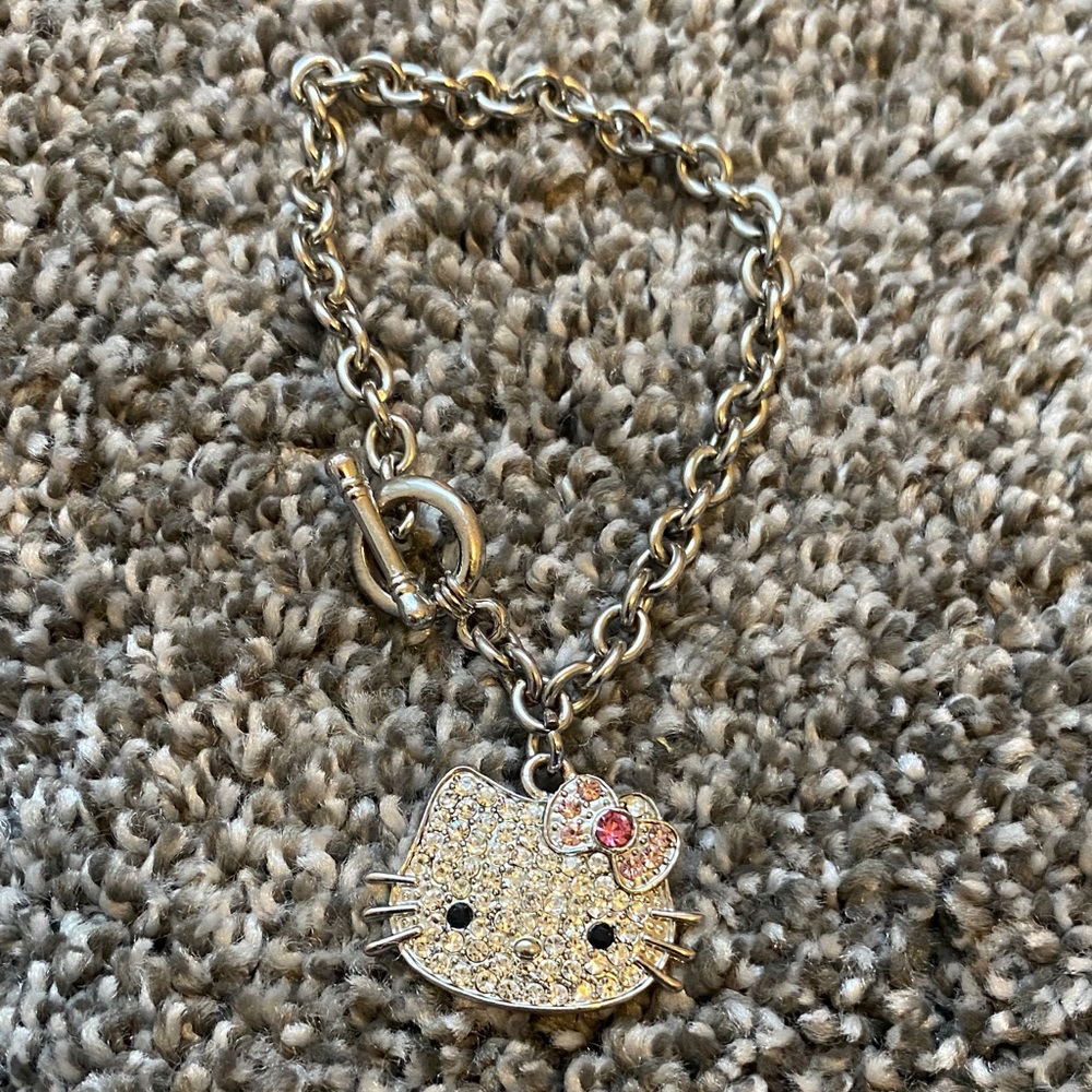 Charming Silver Bracelet with Pink Accents